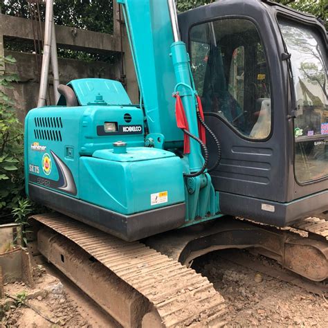 man and mini digger|mini digger second hand.